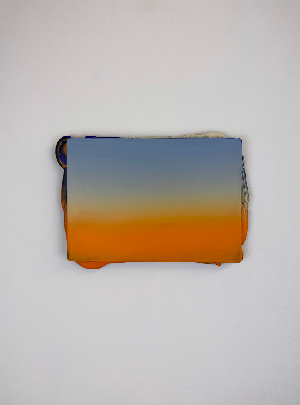 Original minimalist artwork by Welsh Artist Elfyn Lewis. Acrylic paint on MDF board to create a 3D effect with a calming yet striking appearance. An abstract landscape piece inspired by a coastal landscape at sunset, with colours of light blue transitioning into vivid orange. 
