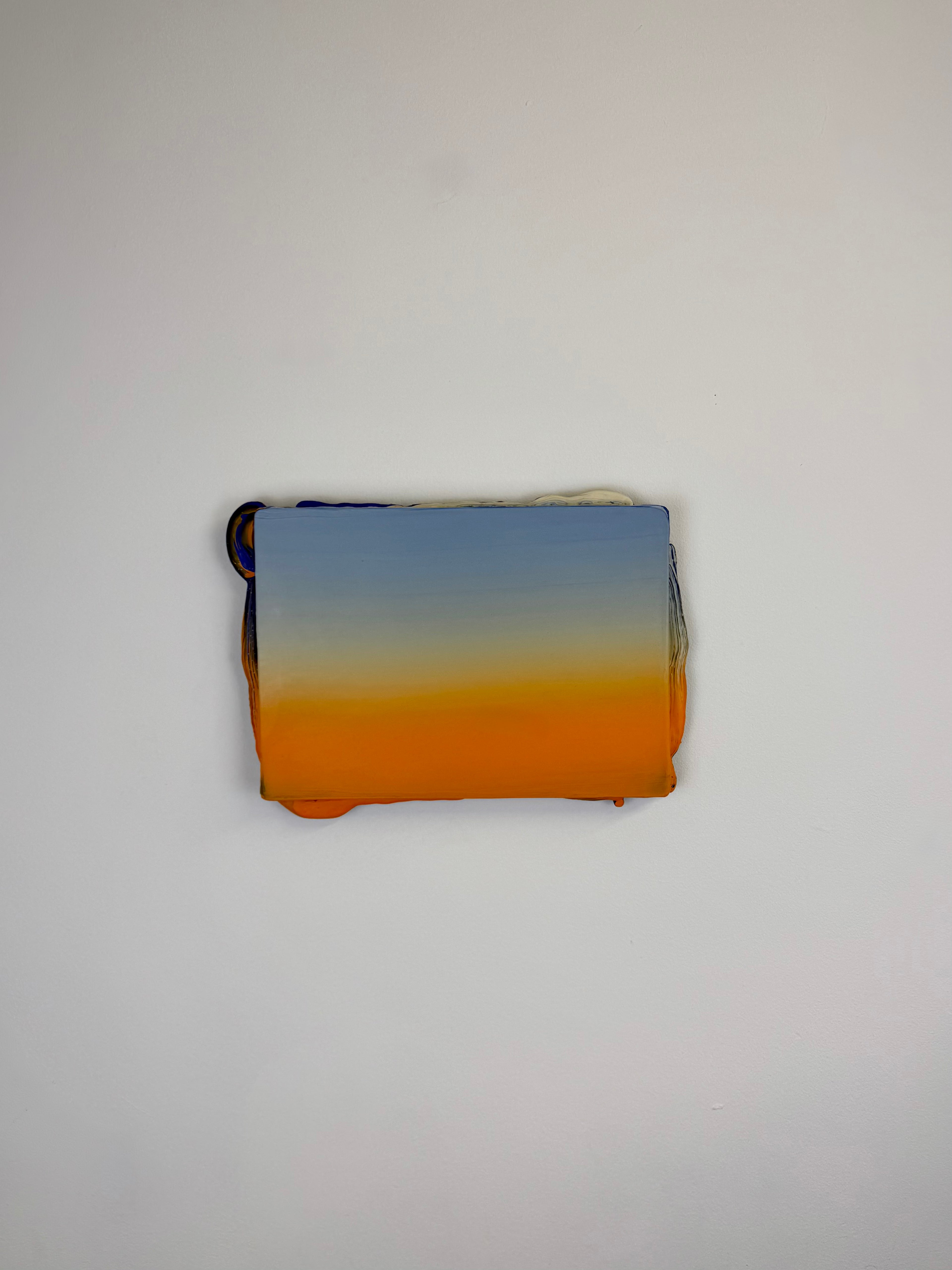 Original minimalist artwork by Welsh Artist Elfyn Lewis. Acrylic paint on MDF board to create a 3D effect with a calming yet striking appearance. An abstract landscape piece inspired by a coastal landscape at sunset, with colours of light blue transitioning into vivid orange. 