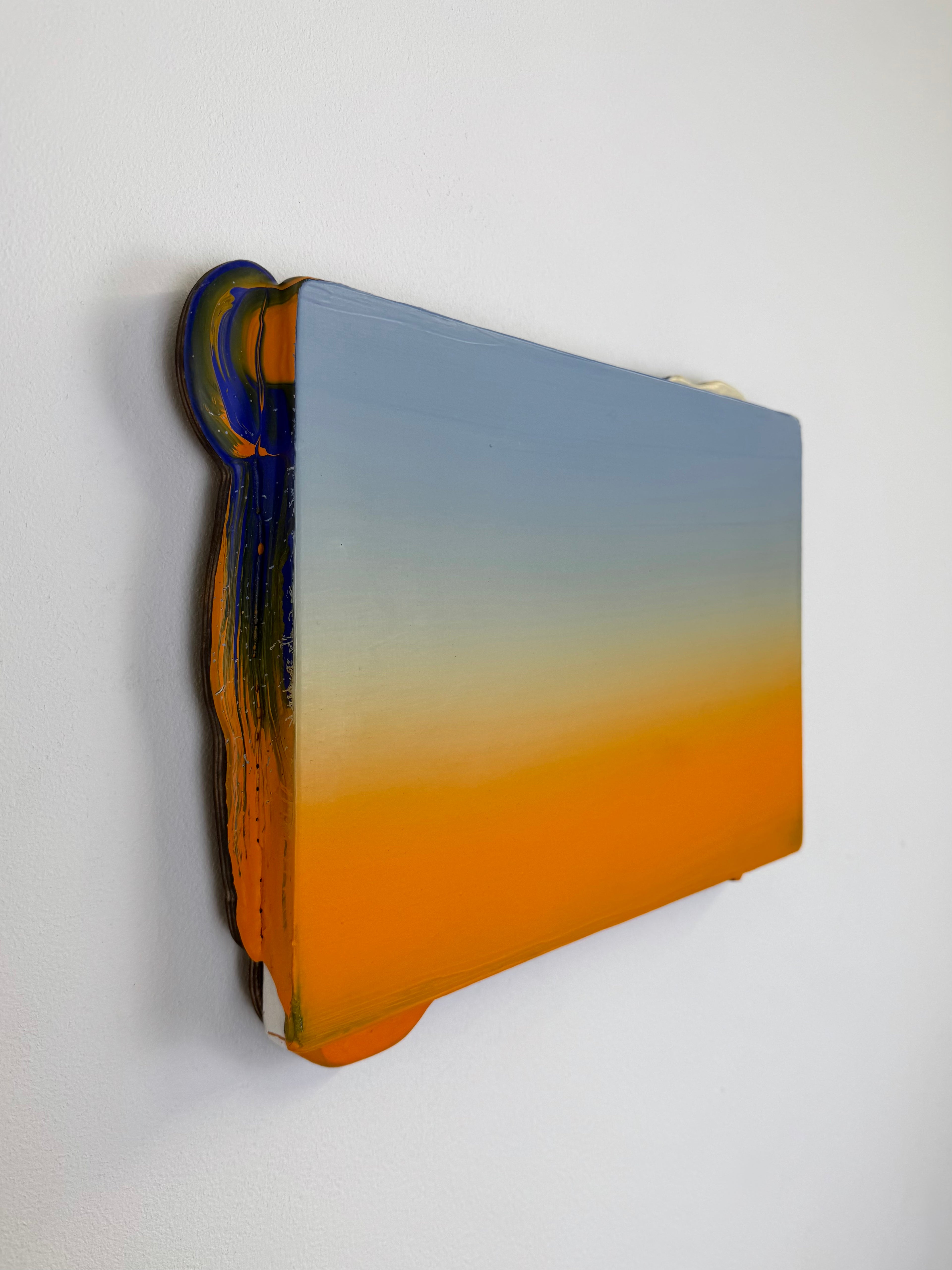 Original minimalist artwork by Welsh Artist Elfyn Lewis. Acrylic paint on MDF board to create a 3D effect with a calming yet striking appearance. An abstract landscape piece inspired by a coastal landscape at sunset, with colours of light blue transitioning into vivid orange. 