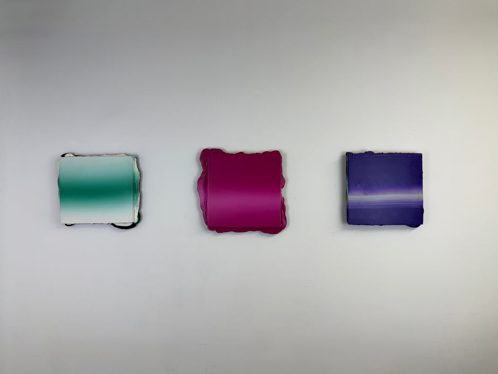 Original minimalist triptych artwork by Welsh Artist Elfyn Lewis. Three curated acrylic paintings on MDF panels to create a strong visual identity and cohesive art language. The abstract art pieces, showcase vivid colours of fresh greens, vivid magenta and transitioning into deeper violets and purples. This Triptych expresses the entire collection and artist voice of Elfyn Lewis.
