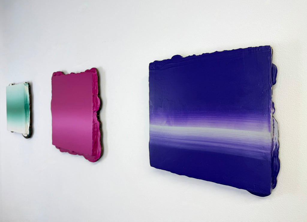 Original minimalist triptych artwork by Welsh Artist Elfyn Lewis. Three curated acrylic paintings on MDF panels to create a strong visual identity and cohesive art language. The abstract art pieces, showcase vivid colours of fresh greens, vivid magenta and transitioning into deeper violets and purples. This Triptych expresses the entire collection and artist voice of Elfyn Lewis. 
