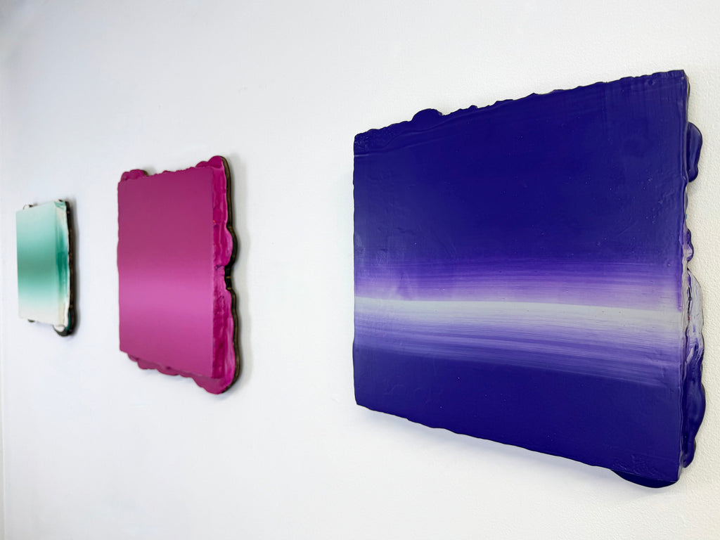 Original minimalist triptych artwork by Welsh Artist Elfyn Lewis. Three curated acrylic paintings on MDF panels to create a strong visual identity and cohesive art language. The abstract art pieces, showcase vivid colours of fresh greens, vivid magenta and transitioning into deeper violets and purples. This Triptych expresses the entire collection and artist voice of Elfyn Lewis. 