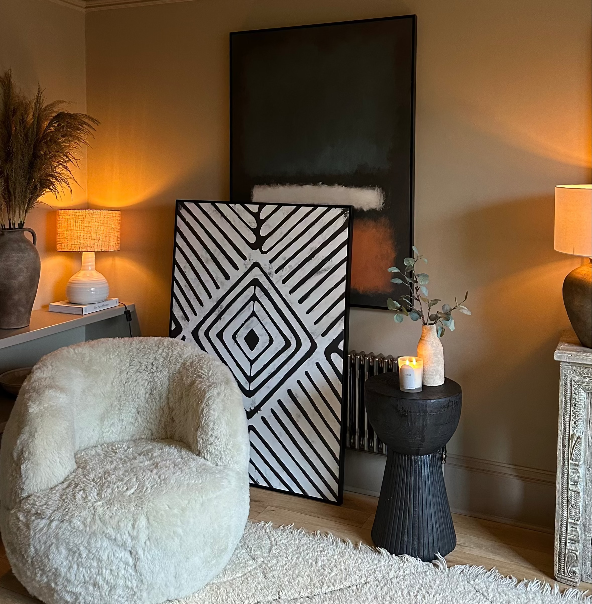 Expert Art Curation service from private residential client and commercial or hospitality clients. Mark Rothko inspired art placed within a moody and contemporary living room inspired by Amber Interiors style. 