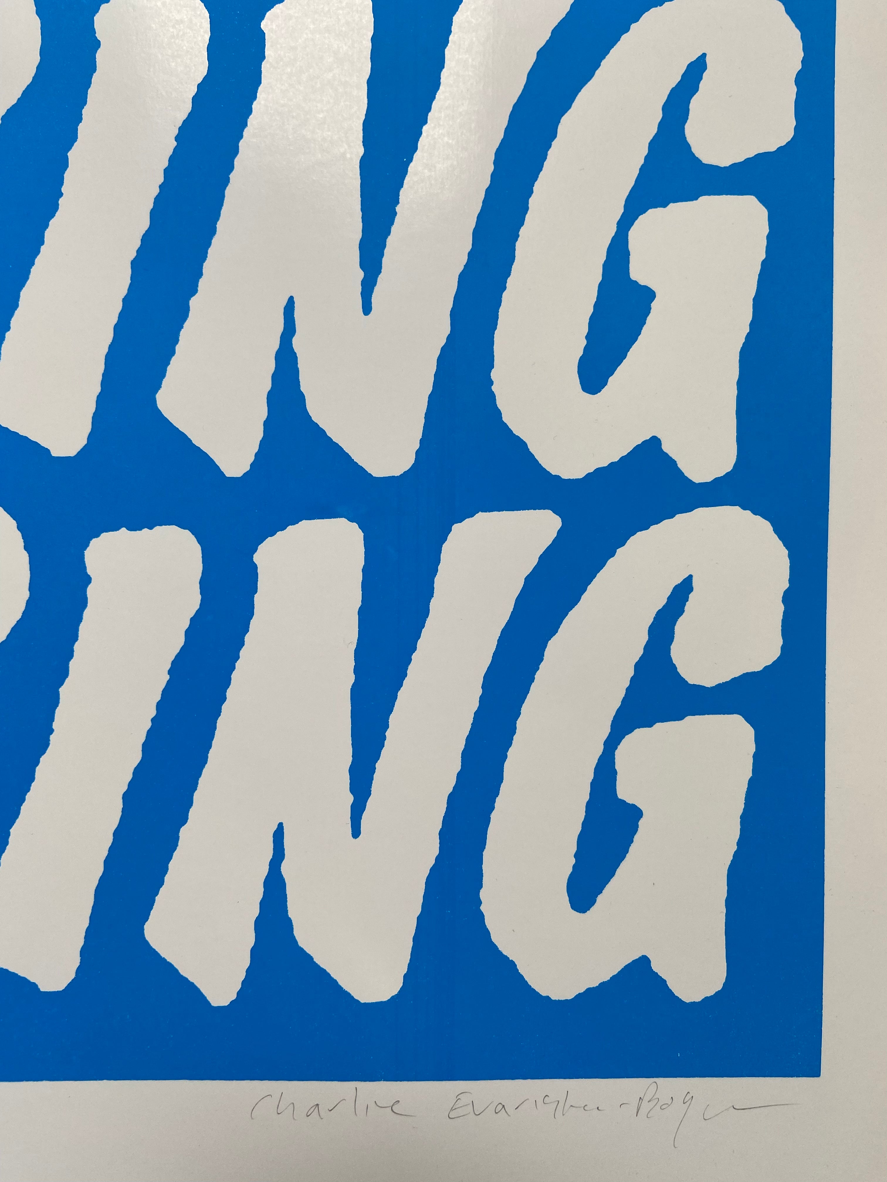 Graphic screen print repeated on a blue background
