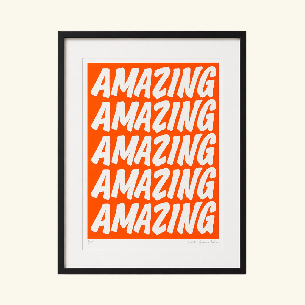 A framed typographic orange art print featuring the word 'AMAZING' by  margate artist Charlie Evaristo Boyce as seen on The Big deal  with Steph McGovern BBC 2