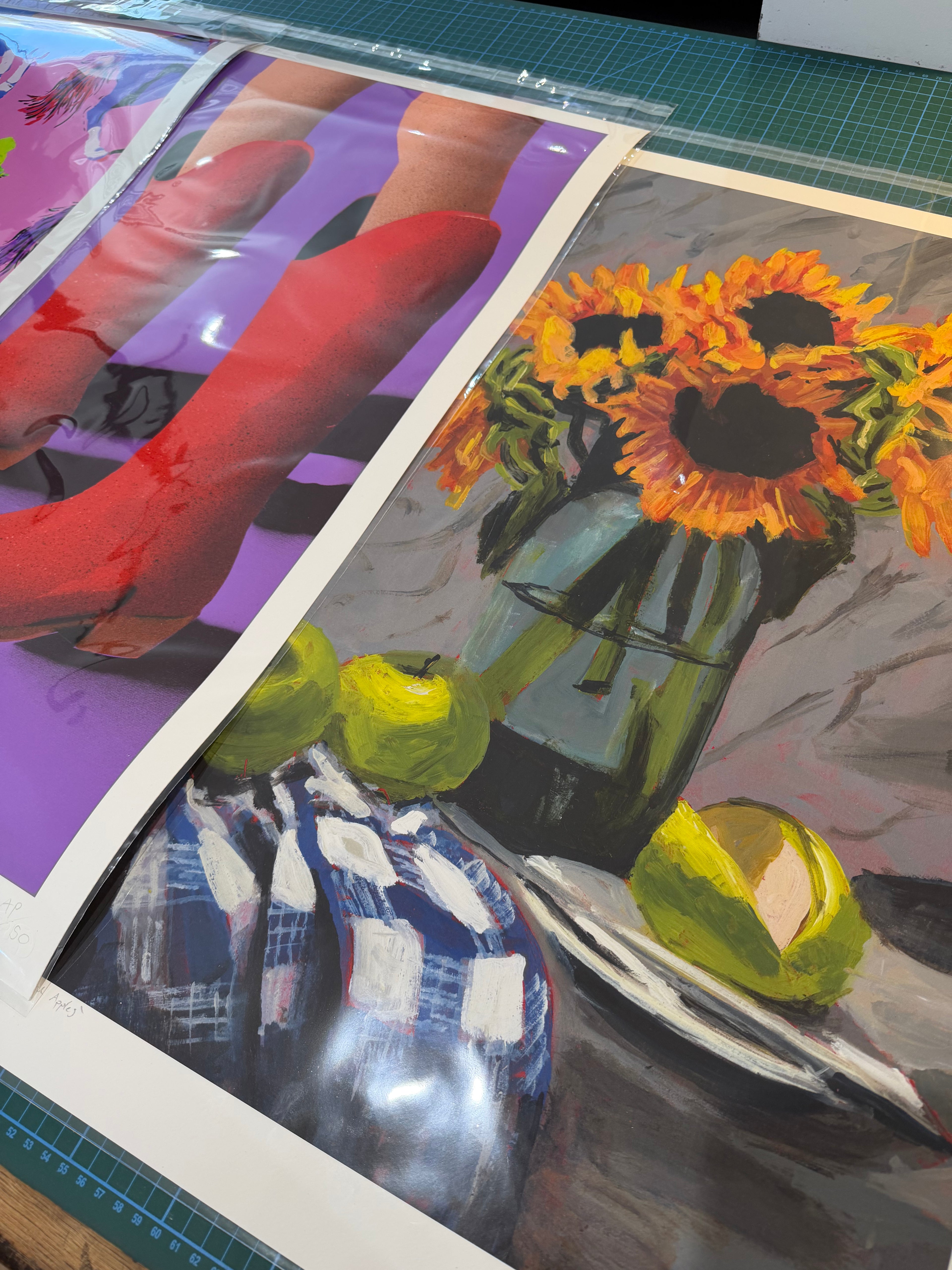 Sunflowers by Maximillian Boxer, contemporary still life print featuring vibrant yellow sunflowers in a glass vase with green apples, painted in expressive oil brushstrokes.