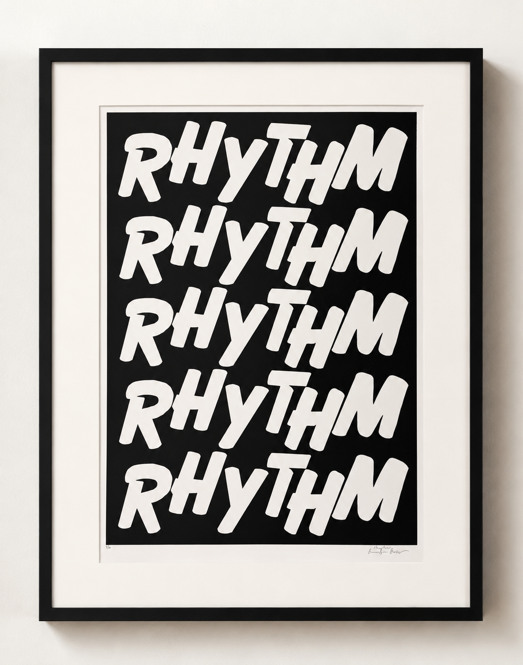 Framed artwork with the word 'RHYTHM' repeated in a stylized font on a black background.