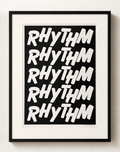 Framed artwork with the word 'RHYTHM' repeated in a stylized font on a black background.