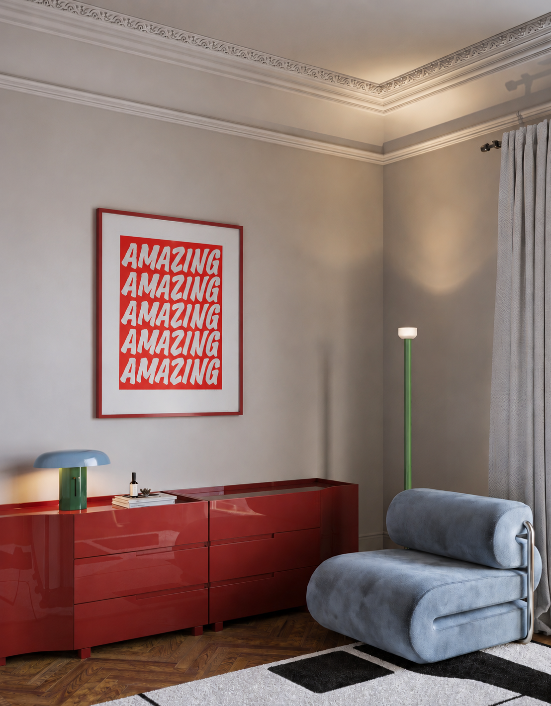 Modern interior with a red dresser, gray chair, and 'AMAZING' artwork on a beige wall.